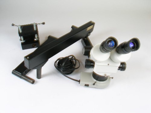 Scienscope binocular microscope w/ articulating arm 