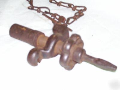 Antique cast iron drill bit valve with chain