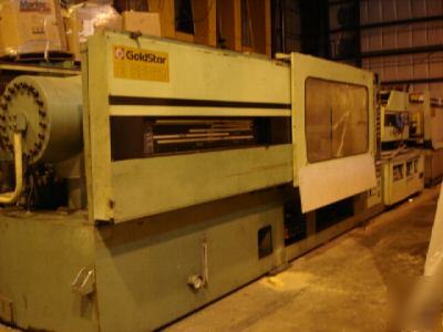 605 ton, 67 oz. goldstar injection molding machine '89