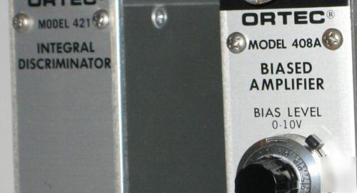 Ortec model 408A biased amplifier and 421 discriminator