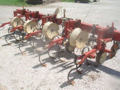 Noble 4 row danish tine cultivator , very good