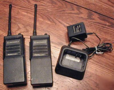 2 motorola radius P100 hand held radios w charger
